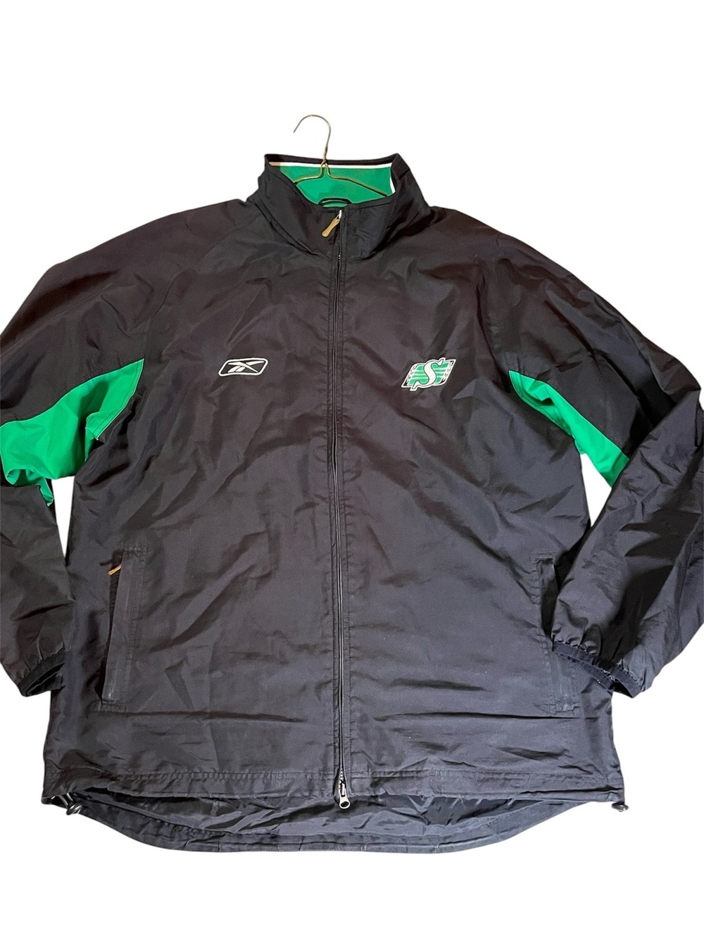 Reebok CFL Black and Green Windbreaker Jacket 
SK Roughriders
Large
Rider pride
